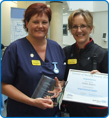 Debbie Beynon receives her award from Director of Nursing Sue Jones at Nurses Day 2016 awards Debbie Beynon receives her award from Director of Nursing Sue Jones at Nurses Day 2016 awards