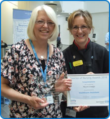 Hazel Crudge receives her award from Director of Nursing Sue Jones at Nurses Day 2016 awards Hazel Crudge receives her award from Director of Nursing Sue Jones at Nurses Day 2016 awards
