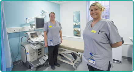 Health Care Assistant in consulting room Health Care Assistant in consulting room