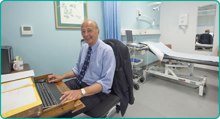 Mr Zenon Rayter in consulting room Mr Zenon Rayter in consulting room