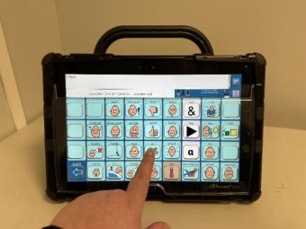 AAC direct touch access device with finger touching screen