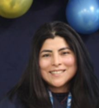 Woman's face against blue background with balloons