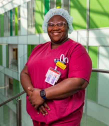 Deborah Akadiri, Anaesthetic Team Leader at NBT, standing in uniform in the Brunel Building