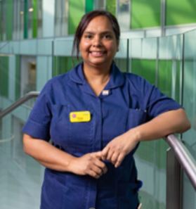 Pooja Poddar, a Band 6  Sister in NBT's  Medical Day Care division pictured in uniform standing in our Brunel building