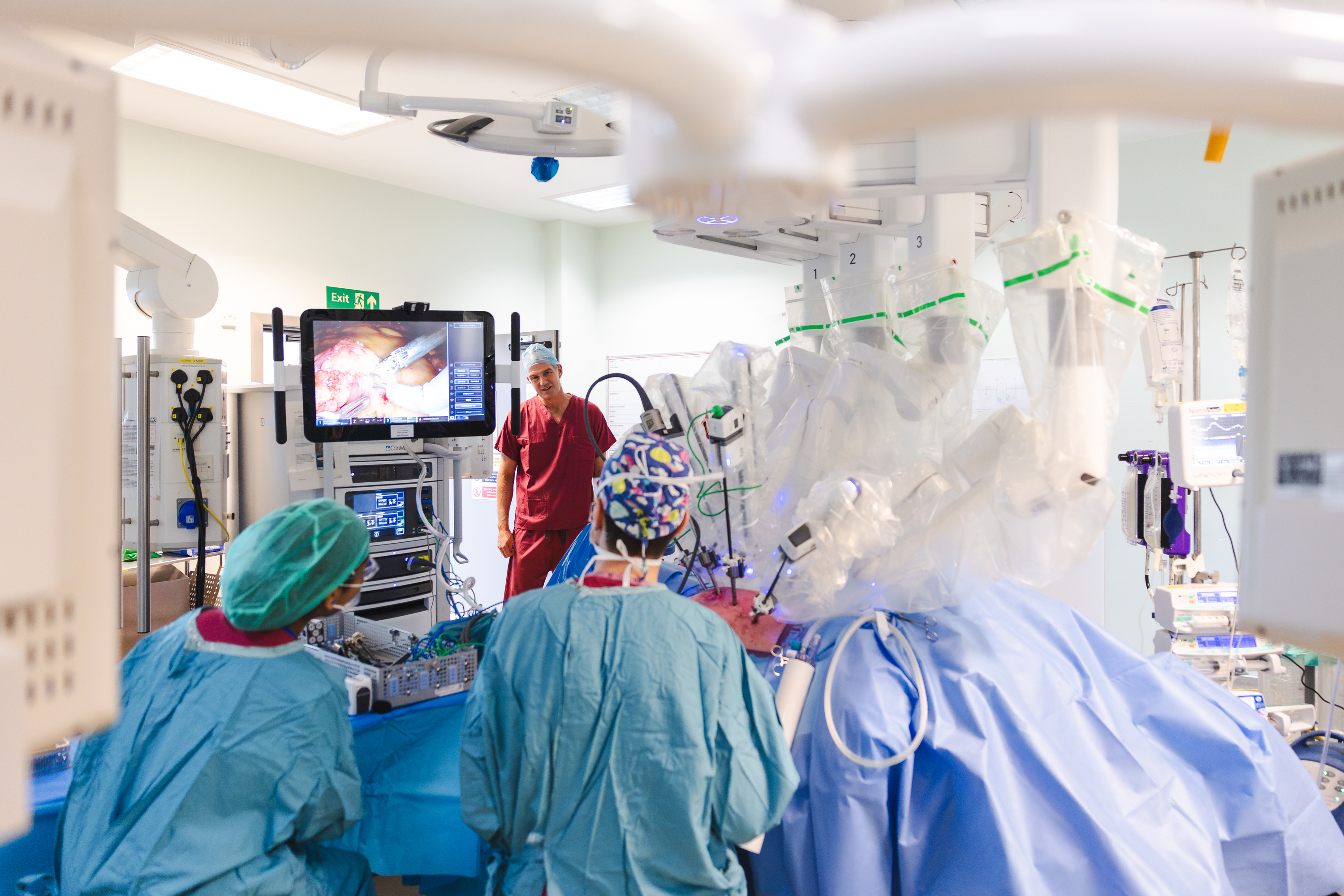 Secretary of State watching robotic surgery in theatre Secretary of State watching robotic surgery in theatre