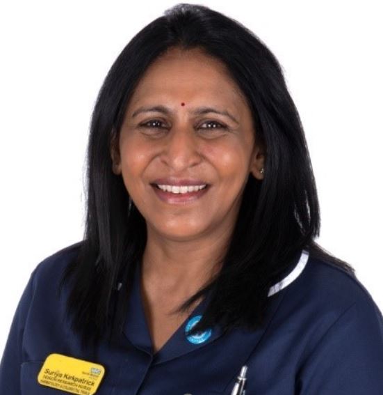 Suriya Kirkpatrick, Senior Cancer Research Nurse at NBT, posing in uniform against a plain white background