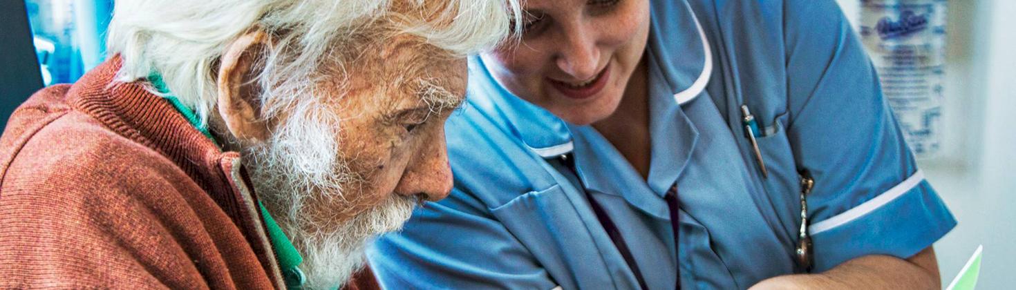 Nurse tending to a patient