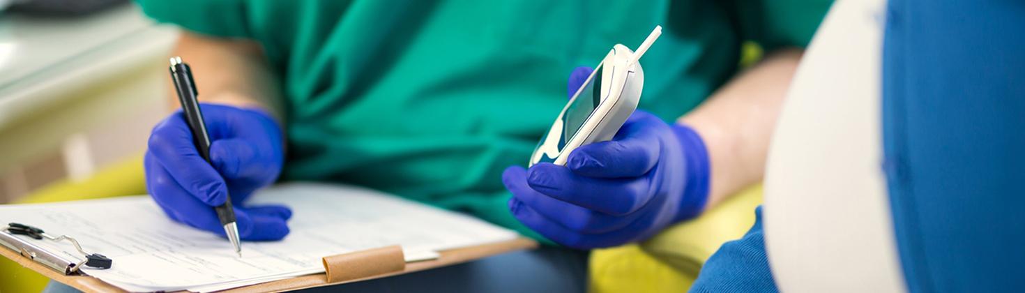 Patient receiving a blood glucose test