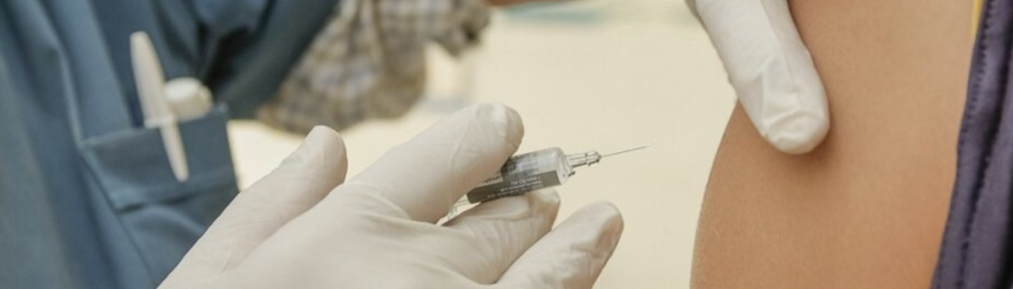 Patient receiving COVID vaccine