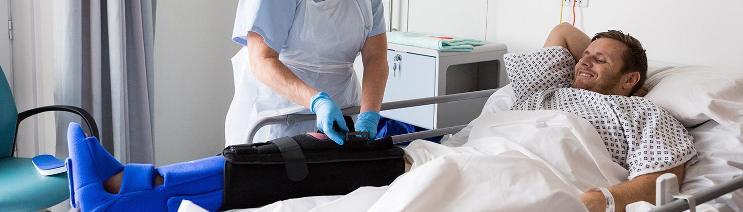 Nurse tending to a patient