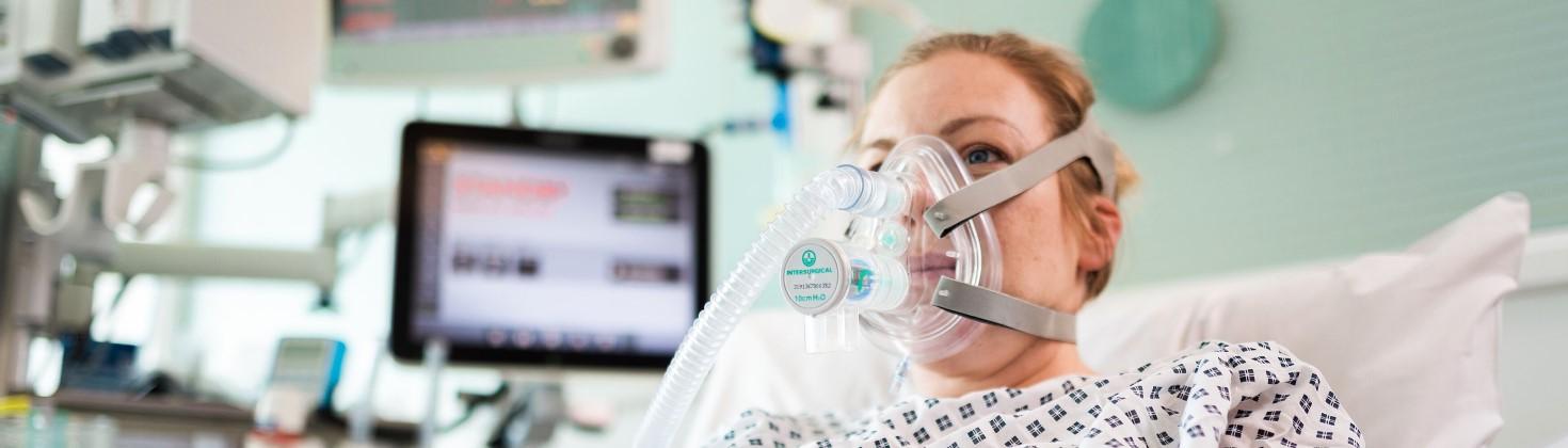 Patient wearing an oxygen mask