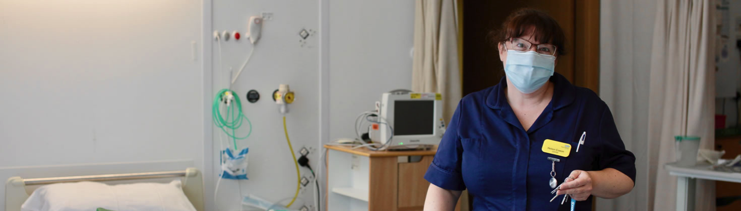 Female nurse in bedroom