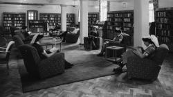 Black and white photo of Nurses in the Southmead Hospital library, around the year 1960.