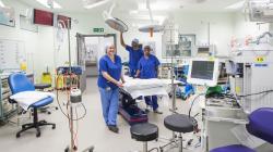 View of a Theatre with lots of equipment and hospital staff