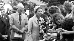 Black and white photo of Princess Anne outside Southmead Hospital.