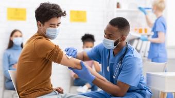 Patient receiving COVID vaccine