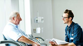 Doctor talking to patient