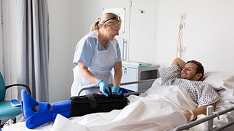 Nurse tending to a patient