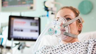 Patient wearing an oxygen mask