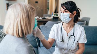 Nurse tending to a patient