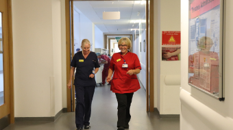 Matron and Nurse working through corridor Matron and Nurse working through corridor