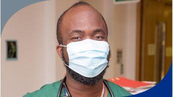Smiling doctor wearing a mask