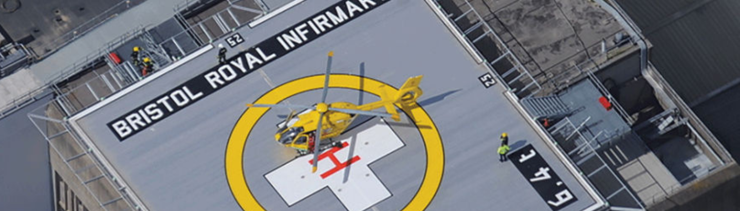 Helicopter on landing pad on top of hospital