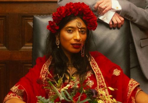 Communications Officer Anita Senaratna in traditional South Asian wedding clothing