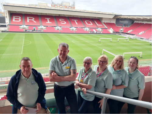 The health checks team standing in front of the pitch at Ashton Gate 