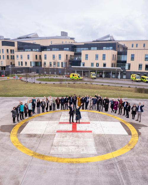 Mayor of West of England and Ingrid Barker with staff on the helipad.