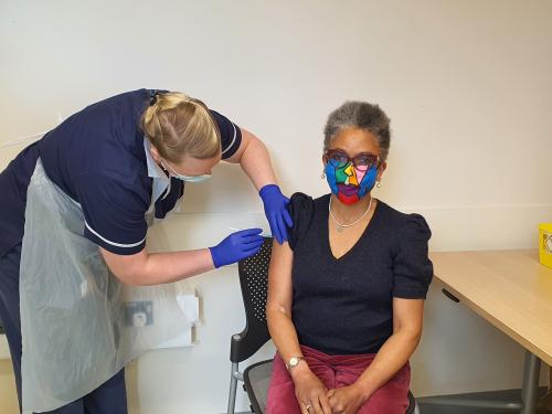 Lord Lieutenant of Bristol, Peaches Golding, receives her COVID-19 jab as part of the Com-COV trial