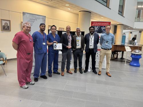 Members of NBT's PERT stand with Deputy Chief Medical Director Sanjoy Shah, holding their award from Thrombosis UK.