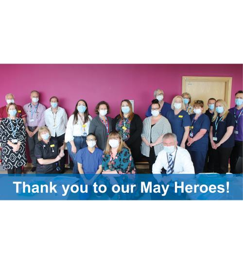 A collection of North Bristol NHS Trust staff members Image of members of staff posed for a photo with blue banner along the bottom which reads "Thank you to our May Heroes!"