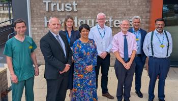Group of colleagues with visitors Professor Meghana Pandit and Dr Trevor Smith visiting NBT