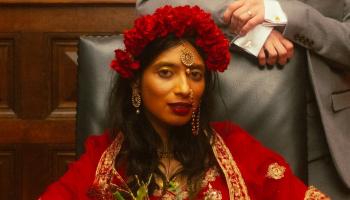 Communications Officer Anita Senaratna in traditional South Asian wedding clothing