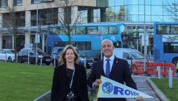 Maria & Adam. Adam holding Bristol Rovers flag