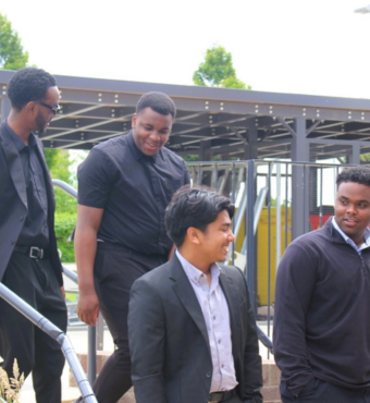 four men outside Southmead Hospital