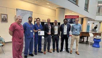 Members of NBT's PERT stand with Deputy Chief Medical Director Sanjoy Shah, holding their award from Thrombosis UK. 
